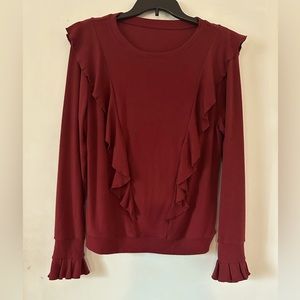 Women’s long sleeve round neck sweater in burgandy